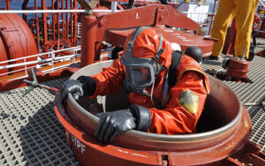 Man in Small Space for Confined Space Training Construction